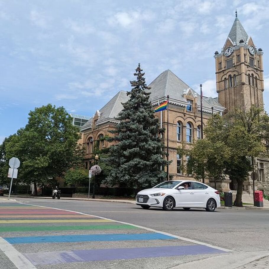 An image of St. Thomas City Hall and the Pride Crosswalk